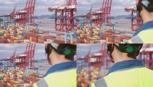 工程师拿着平板电脑在集装箱码头港口工作高清在线视频素材下载