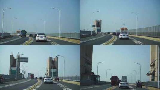 汽车行驶在长江大桥上开车第一视角窗外风景高清在线视频素材下载