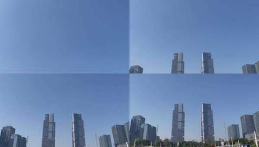 郑州东站站前广场下摇高楼大厦绿地广场高清在线视频素材下载