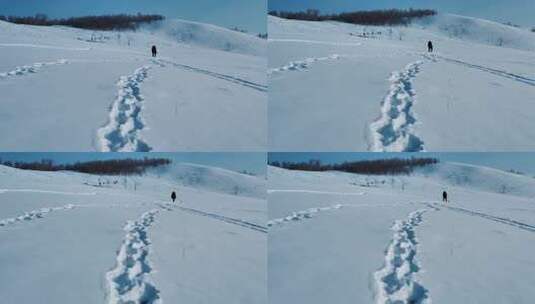 一个人穿过雪原留下一排脚印高清在线视频素材下载