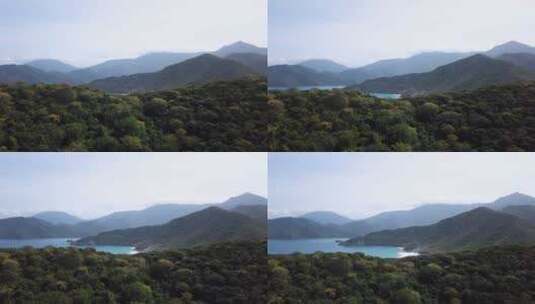 航拍被山脉包围的湖谷高清在线视频素材下载