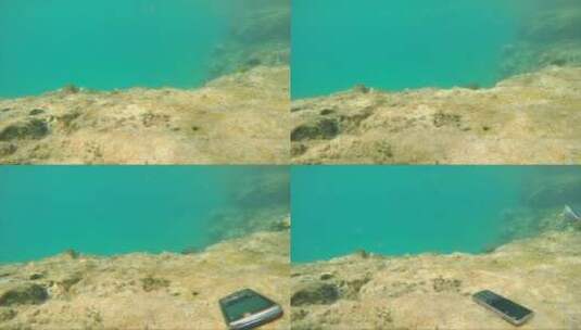 手机被淹没在海水中高清在线视频素材下载