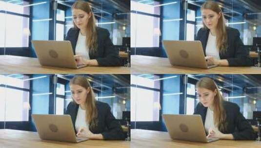 女人对着笔记本电脑庆祝成功高清在线视频素材下载