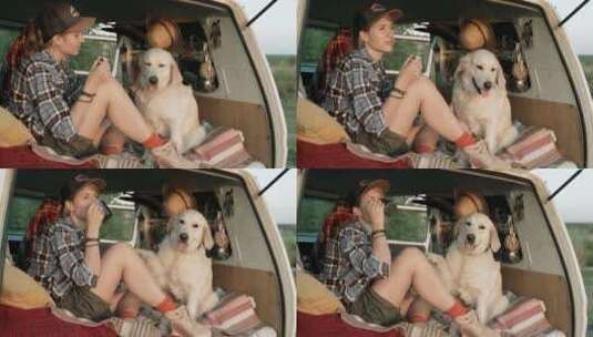 女人和狗在货车里玩耍高清在线视频素材下载