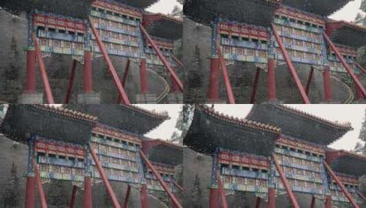 初春北京北海公园中式园林里飘落的雪花高清在线视频素材下载