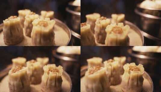 慢镜头升格拍摄美食特色小吃烧麦特写高清在线视频素材下载