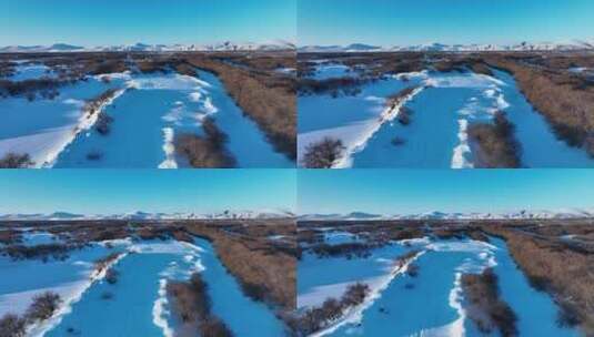 冬季湿地积雪覆盖的远山雪原风光高清在线视频素材下载