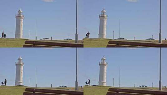 澳大利亚卧龙岗唯美海湾灯塔风景小路长椅高清在线视频素材下载