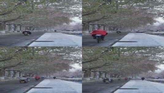 下雪天非机动车道的车辆行人高清在线视频素材下载