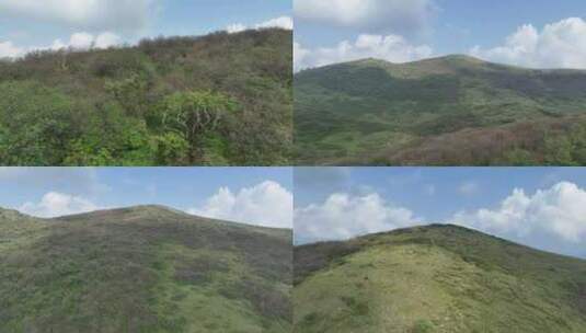 无人机爬山飞行夏日晴空蓝天白云秦岭紫柏山高清在线视频素材下载