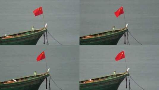 海面上红旗飘扬高清在线视频素材下载