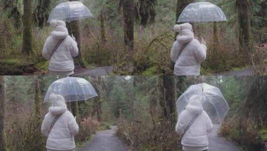 舒适的白色服装和森林中的透明雨伞高清在线视频素材下载