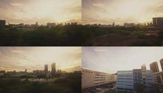 高铁行驶中列车窗外城市夕阳风景高清在线视频素材下载