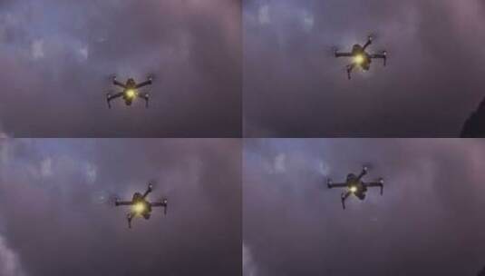 无人机在多云的天空下飞行高清在线视频素材下载
