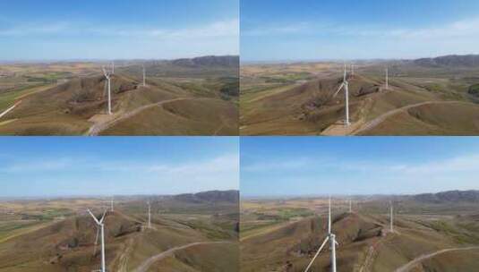 草原上矗立的新能源风力发电的风车高清在线视频素材下载