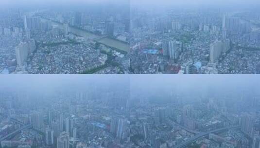 穿越云雾环绕航拍广州城市建筑高清在线视频素材下载