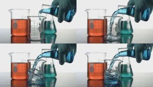 在科学烧杯里浇注液体高清在线视频素材下载