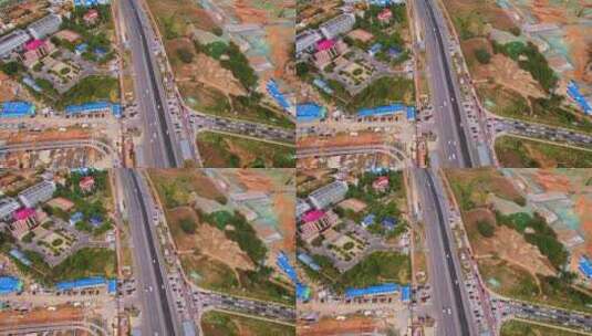 鸟瞰城郊区道路交通高清在线视频素材下载