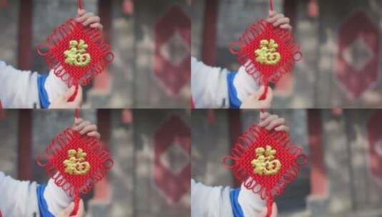 亚洲中国人女性女人过年贴春联贴福字高清在线视频素材下载