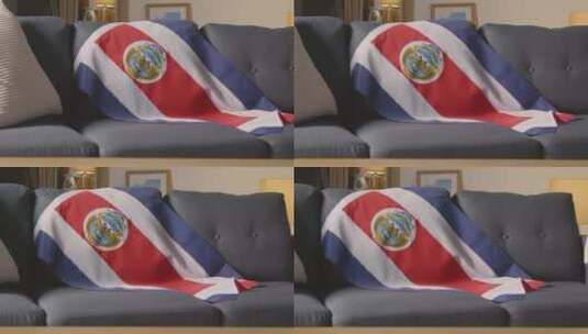哥斯达黎加国旗挂在家里的沙发上高清在线视频素材下载