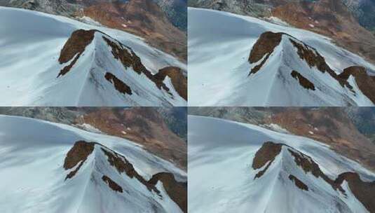 航拍攀登沙鲁里山脉尼登贡嘎雪山的登山者高清在线视频素材下载