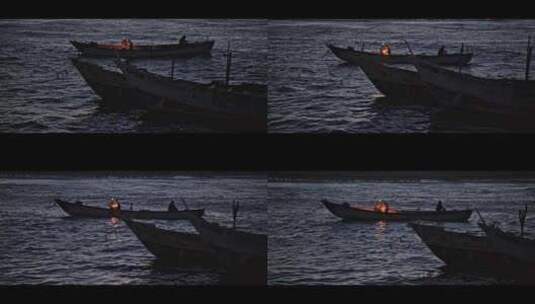 FPV无人机航拍渔民夜晚在渔船上捕鱼工作高清在线视频素材下载