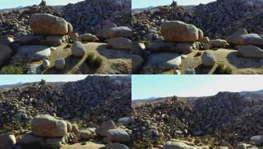 在加利福尼亚州博尔德花园，无人机拍摄的大石头上升。高清在线视频素材下载