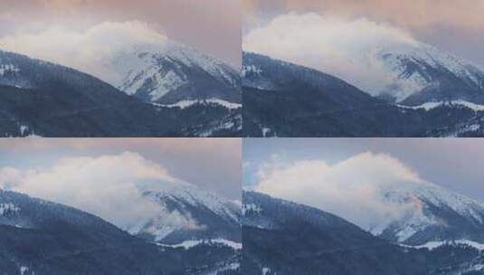 冬季景观中黄昏时的云在山上移动高清在线视频素材下载