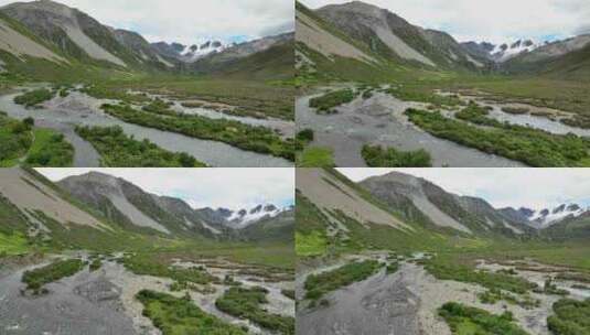 航拍川西格聂山区阿萨贡格雪山草原风光高清在线视频素材下载