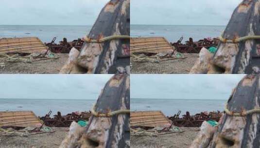 海岸上的渔船废墟和垃圾。剪辑。高清在线视频素材下载
