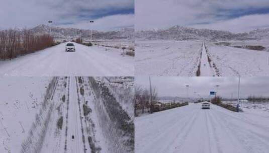 汽车行驶在冰天雪地航拍雪景公路高清在线视频素材下载