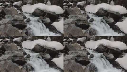 特写被大雪覆盖的森林小溪高清在线视频素材下载