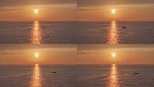海上夕阳下的渔船景象高清在线视频素材下载