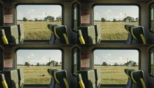 火车车厢内窗外田野风光高清在线视频素材下载