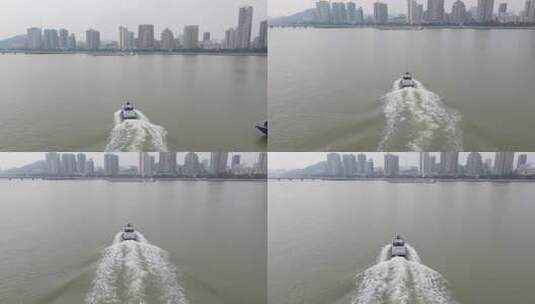 江上行驶的游艇与城市景观高清在线视频素材下载