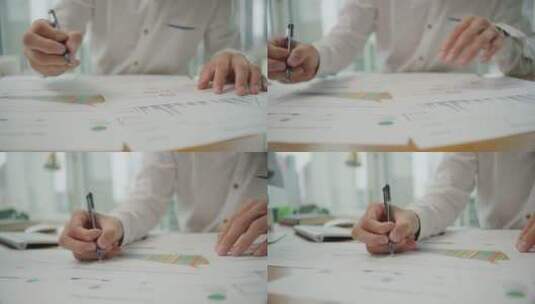 男人用笔在纸上记录高清在线视频素材下载