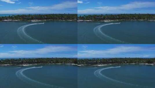 航拍海湾中的尾拖冲浪高清在线视频素材下载