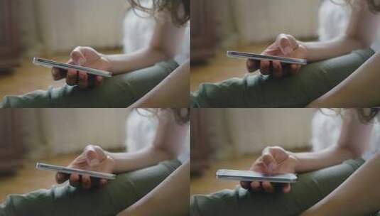 女性手持智能手机操作画面高清在线视频素材下载
