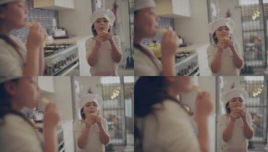 厨房里吃面包的女孩高清在线视频素材下载