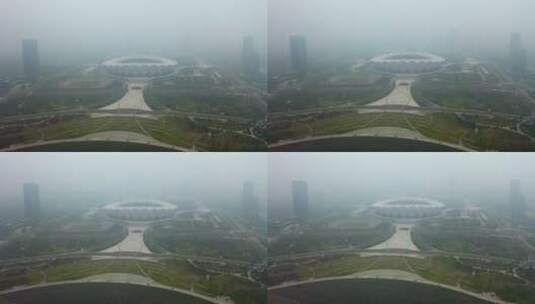 雾霾下的西安奥体中心鸟瞰图高清在线视频素材下载