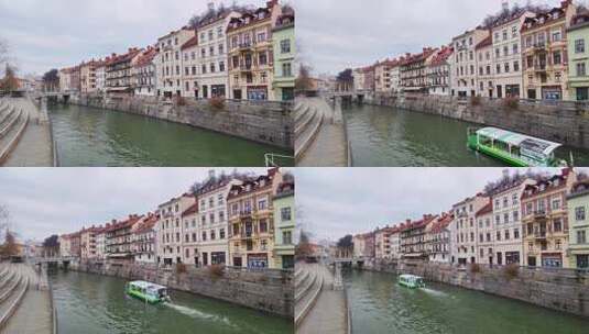 船在斯洛文尼亚首都卢布尔雅那的运河高清在线视频素材下载