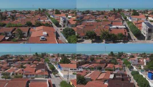 无人机飞越巴西北里奥格兰德加林霍斯半岛的村庄房屋。宽天线高清在线视频素材下载