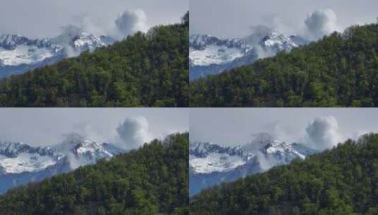 风景优美的绿色山脊，云层笼罩着尖尖的阿尔卑斯山山顶；无人机高清在线视频素材下载