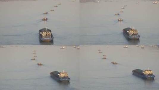 航拍长江南京段货船排成一列顺流而下高清在线视频素材下载