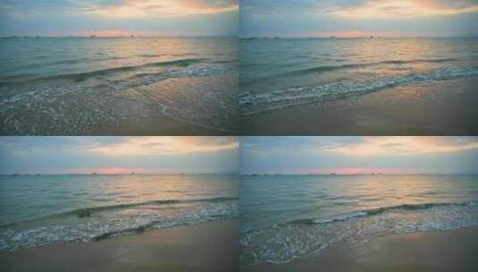 海南三亚湾海水浴场傍晚沙滩夕阳海浪高清在线视频素材下载