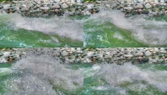 拍摄流动的绿色河水高清在线视频素材下载