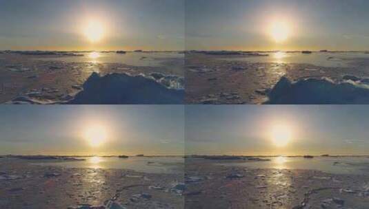 北极冬季景观上的彩色日落高清在线视频素材下载