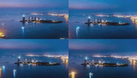 中国海南三亚三亚湾凤凰岛夜景延时摄影高清在线视频素材下载