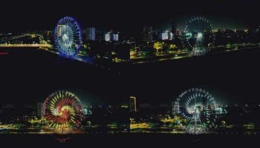 广东茂名摩天轮夜景航拍高清在线视频素材下载