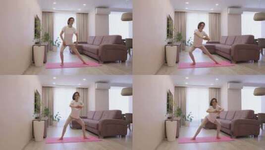 运动高加索女人做运动在家里高清在线视频素材下载